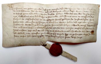 Niederdeutscher Lehensbrief auf Pergament, Münster 5. Februar 1495, im Namen Heinrichs von Schwarzburg (Bischof von Münster), mit angehängtem rotem Siegel.
